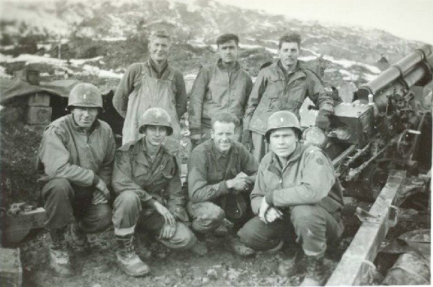Lieutenant Bill Neubel(far left) poses with other officers of the 328th FA